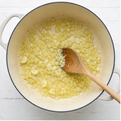 Step 1: Sautéing onion in butter and olive oil