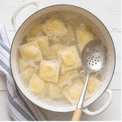 Step 1: Boil ravioli in salted water until tender
