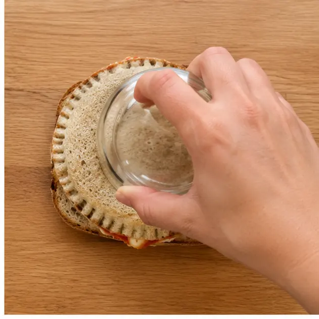 Step 2: Press sandwich sealer firmly to seal edges and remove crusts