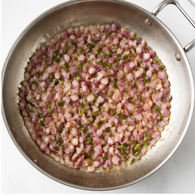 Step 2: Sautéing red onion and jalapeño in the same skillet