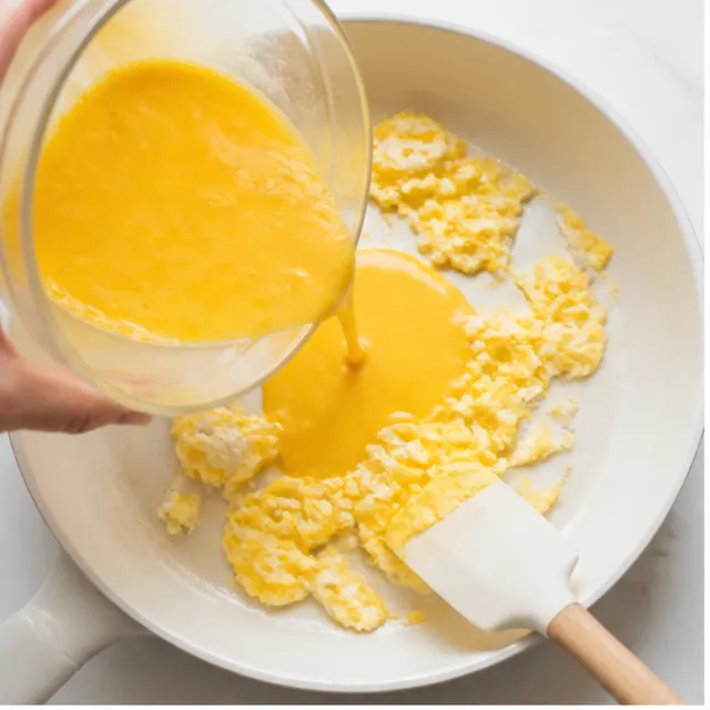 Step 1: Scrambling the eggs in a hot skillet