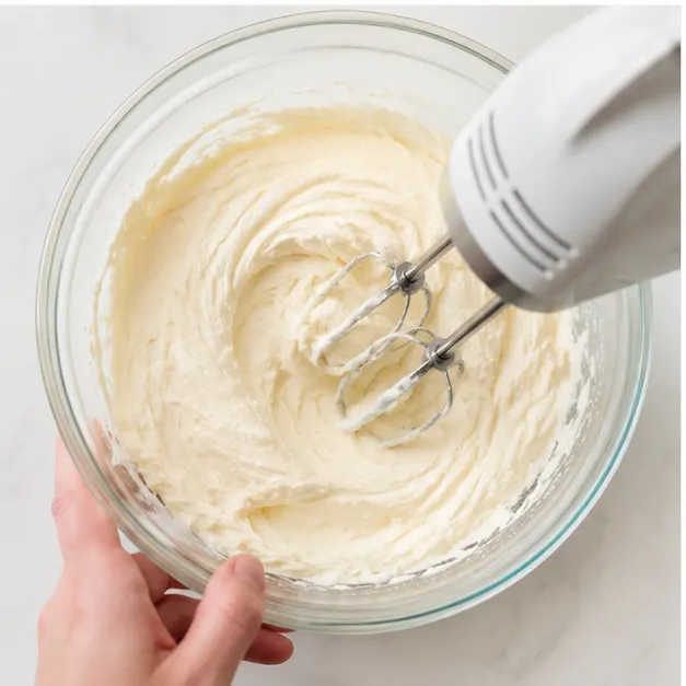 Step 3: Beating cream cheese and sugar into a smooth filling