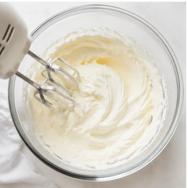 Step 3: Beat room temperature cream cheese with powdered sugar until smooth