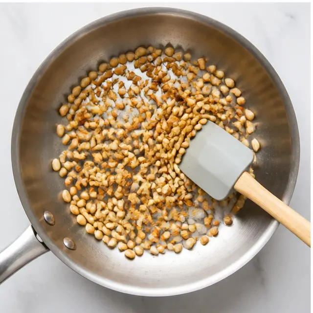 Step 3: Toast the pine nuts in a dry skillet until golden and fragrant.