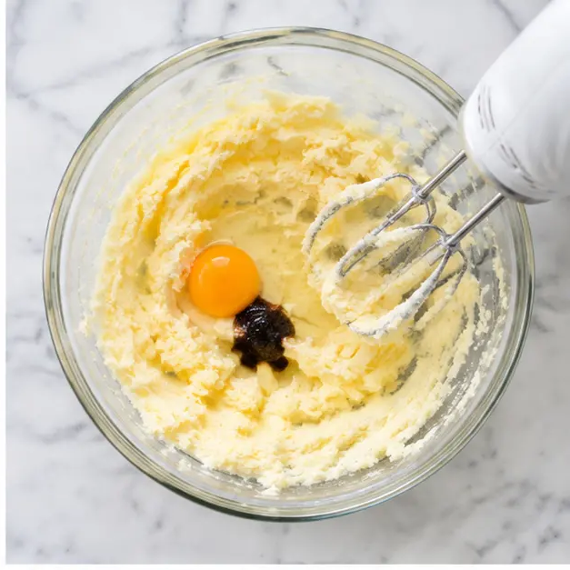Step 2: Mix in egg yolk and vanilla