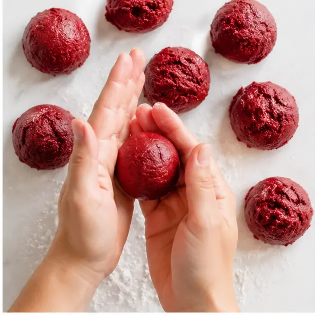 Step 2: Scoop and roll the red dough into small balls