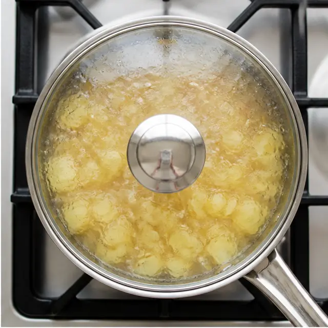 Step 2: simmer the apples with water and spices until tender